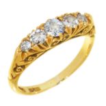 A FIVE STONE DIAMOND RING in 18ct gold, 3.3g, size K ½ No damage to diamonds. Light wear to gold