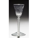 AN ENGLISH WINE GLASS, C1765 the fluted round funnel bowl on double series opaque twist stem and