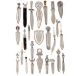 TWENTY FIVE VICTORIAN AND LATER SILVER BOOK MARKS,  MOSTLY EARLY 20TH C, various designs, the handle