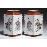 A PAIR OF CHINESE FAMILLE ROSE LOZENGE SECTION VASES, QING DYNASTY, 19TH C painted to the four sides