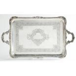 A GEORGE V SILVER TEA TRAY   with gadrooned rim, 69cm over handles, by The Goldsmiths & Silversmiths