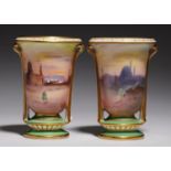 A PAIR OF ROYAL DOULTON VASES painted by H Allen, both signed, with continuous Egyptian scenes at