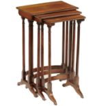 A TRIO NEST OF REGENCY ROSEWOOD TABLES, C1810 the oblong top and bow stretcher each with brass pearl