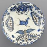 ISLAMIC CERAMICS.  A SAFAVID POTTERY, (FRIT PASTE),  DISH, 17TH C /EARLY 18TH C the gently rounded
