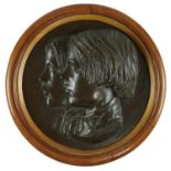 A VICTORIAN BRONZE TONDO BAS RELIEF PORTRAIT OF THE HEADS OF TWO CHILDREN, THIRD QUARTER 19TH C