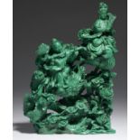 A CHINESE MALACHITE GROUP, 20TH C   of Guanyin and phoenix, her attendant musician on a dragon above