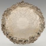 AN EDWARD VII SILVER SALVER  with engraved field and applied grapevine rim, on three feet, 35cm