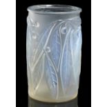 LAURIER. A LALIQUE SEMI OPALESCENT GLASS VASE 17.7cm h, etched mark R LALIQUE Slight manufacturing