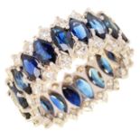 A SAPPHIRE AND DIAMOND ETERNITY RING with marquise sapphires, in white gold, 10g, size R In good