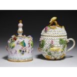 A MEISSEN SCHNEEBALLEN CABINET CUP AND COVER AND A GERMAN FLORAL ENCRUSTED TABLE BELL, BOTH C1900,