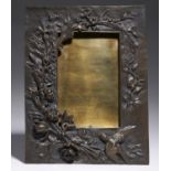 A FRENCH ART NOUVEAU BRONZE PHOTOGRAPH FRAME, EARLY 20TH C  cast with bird and flowers, 28 x 21cm