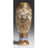 A JAPANESE SATSUMA EARTHENWARE VASE, MEIJI PERIOD painted with two panels of densely peopled