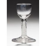 AN ENGLISH CORDIAL GLASS, C1760-70 the ogee bowl on multi series opaque twist stem, conical foot,