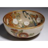 A JAPANESE IMPERIAL SATSUMA EARTHENWARE BOWL, MEIJI PERIOD decorated with swirling textile