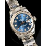A ROLEX STAINLESS STEEL LADY'S WRISTWATCH WITH DIAMOND SET BLUE DIAL OYSTER PERPETUAL DATEJUST Ref