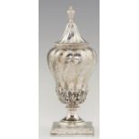 A PORTUGUESE SPIRALLY LOBED OGEE SILVER VASE AND COVER  on square foot, engraved with spiralling