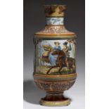 A METTLACH EWER, 1887 decorated with a squire and lady, attendants and animals hunting in a