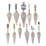 ELEVEN VICTORIAN-GEORGE V SILVER TROWEL BOOK  MARKS  one with enamelled WEMBLEY 1924 lion handle,