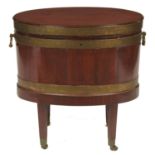 A GEORGE III BRASS BOUND MAHOGANY WINE COOLER, C1800  on brass castors, 61cm  h; 44 x 62cm Drain