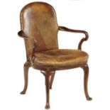 A WALNUT CHAIR IN GEORGE II STYLE, LATE 19TH C the arched, padded back and compass seat covered in