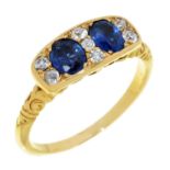 A SAPPHIRE AND DIAMOND RING in gold, unmarked, 5.5g, size  S½ Sapphire facets slightly abraded. No