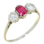 A RUBY AND DIAMOND THREE STONE RING in platinum, 2.8g, size Q Slight abrasions to ruby table facets.