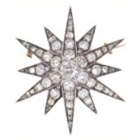 A VICTORIAN DIAMOND STAR BROOCH-PENDANT, C1880 in silver and gold, 3.7cm diam,  7.3g No apparent