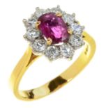 A RUBY AND DIAMOND CLUSTER RING in 18ct gold, London 1983, 3.5g, size M Good condition