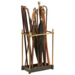 A COLLECTION OF SEVENTEEN WALKING CANES AND UMBRELLAS, LATE 19TH C AND LATER including malacca,