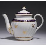 A WORCESTER SHANKED BLUE AND GILT THISTLE PATTERN TEAPOT AND COVER, C1785-90 16cm h, underglaze blue