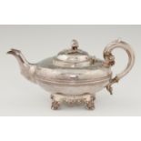A VICTORIAN SILVER TEAPOT  with strawberry knop and foliate engraved upper body, reeded girdle, 13cm
