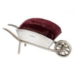 AN EDWARD VII SILVER WHEELBARROW NOVELTY PIN CUSHION  8cm l, by Saunders & Shepherd, Birmingham 1908