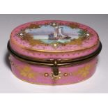 AN OVAL FRENCH BRASS MOUNTED SEVRES STYLE PORCELAIN BOX, C1900 the lid painted with boats in