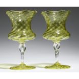 A PAIR OF WRYTHEN FLUTED AND WAISTED CITRON GLASS GOBLET SHAPED VASES, C1900  with crimped rim on