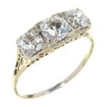 A THREE STONE DIAMOND RING the old cut diamonds 1.57ct approx, in white gold, 2g, size P½ Good