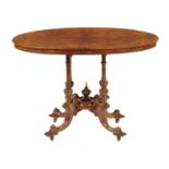 A VICTORIAN BUTTERFLY VENEERED  WALNUT AND INLAID LOO TABLE, C1870  70cm h; 60 x 105cm Good restored