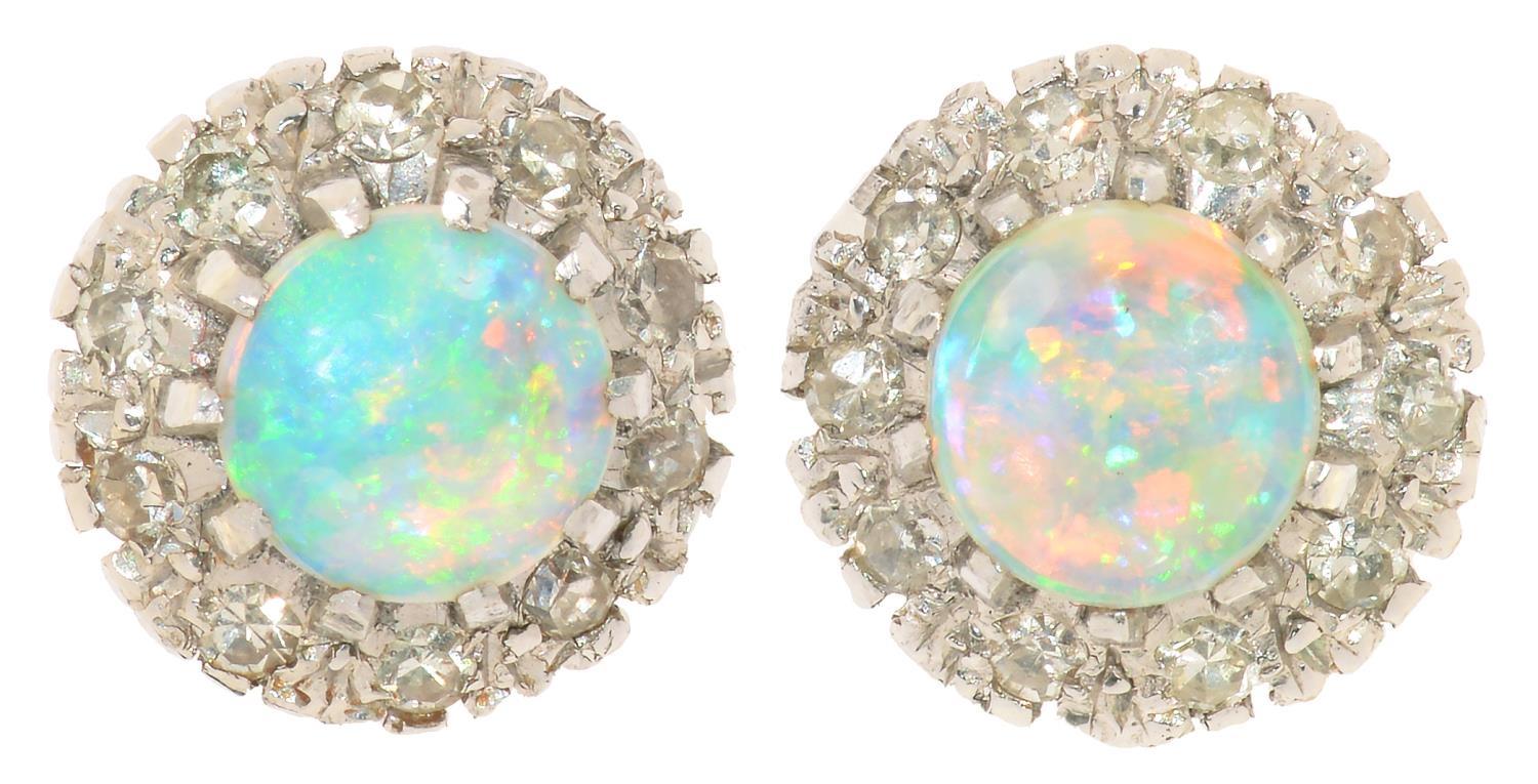 A PAIR OF OPAL AND DIAMOND EARRINGS in white gold, 10 mm w, marked 9ct, 4g In good condition,