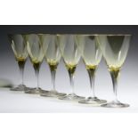 A SET OF SIX FLASHED AND FINELY CUT WINE GLASS, EARLY 20TH C  the conical bowl on tapered