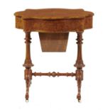 AN UNUSUAL VICTORIAN SERPENTINE WALNUT AND BURR WALNUT COMBINED WRITING AND WORK TABLE, C1870  the