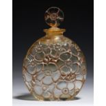 LE LYS.   A LALIQUE BROWN STAINED GLASS  SCENT FLACON AND STOPPER, DESIGNED 1922 moulded to one side