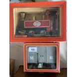 A MAMOD LIVE STEAM 0-4-0  MODELTANK LOCOMOTIVE IN MAROON LIVERY AND A LIGHT GREY GOODS VAN BY THE