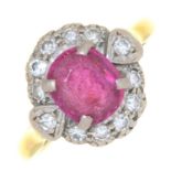 A RUBY AND DIAMOND CLUSTER RING IN 18CT GOLD, THE OVAL RUBY APPROX 7 X 6 MM, TOWN AND DATE MARKS