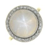 A STAR MOONSTONE AND DIAMOND RING IN WHITE GOLD, MOONSTONE CABOCHON APPROX 12 MM DIAM, UNAMRKED, 6.