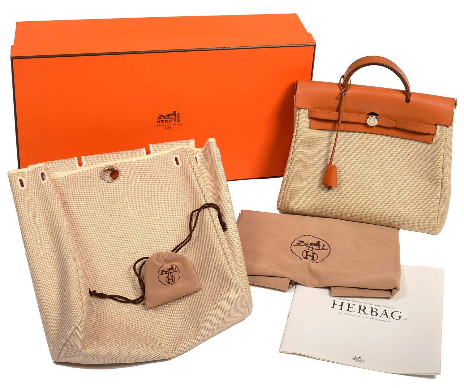 HERMES. 'HERBAG 2 IN 1', IN BEIGE CANVAS AND BROWN LEATHER,  PROTECTIVE BAG, BOX AND BROCHURE