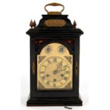AN EBONISED BRACKET CLOCK IN LATE 18TH C ENGLISH STYLE WITH BREAKARCHED BRASS DIAL AND THREE TRAIN