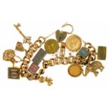 A 9CT GOLD CHARM BRACELET, TO INCLUDE A HALF SOVEREIGN 1910, A 10 MEXICAN PESOS GOLD COIN, AN 18CT