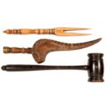 TREEN. A GOOSE WING KNITTING SHEATH, 23CM L, A FORK AND AN EBONISED GAVEL GAVEL  23CM L