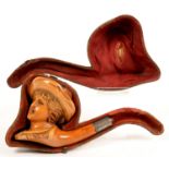 AN AUSTRIAN MEERSCHAUM TOBACCO PIPE, THE BOWL CARVED  AS THE HEAD OF A YOUNG WOMAN IN A BONNET,