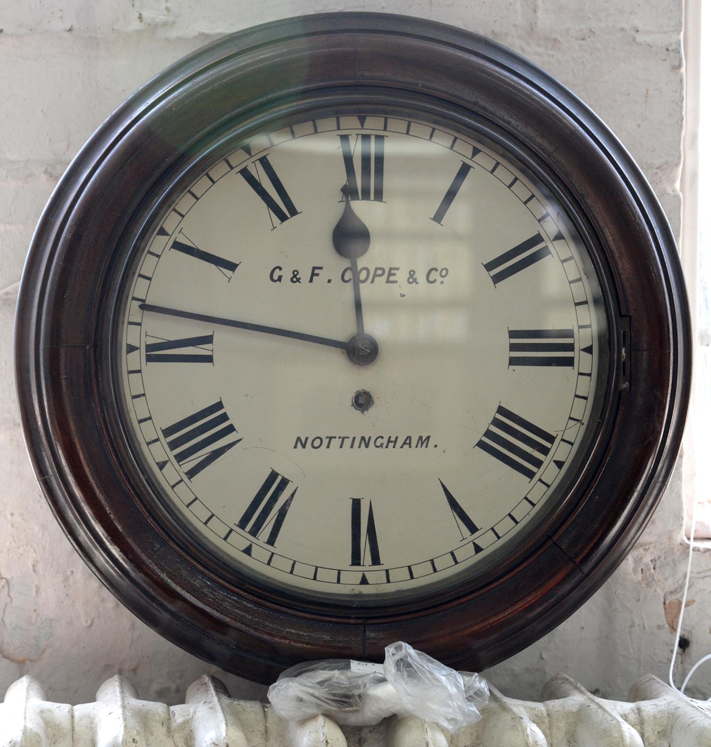 A VICTORIAN MAHOGANY WALL CLOCK, THE ENAMEL DIAL INSCRIBED G & F COPE AND CO NOTTINGHAM, 43CM D