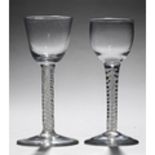 AN ENGLISH WINE GLASS, C1770, THE LIPPED OVOID BOWL ON DOUBLE SERIES OPAQUE TWIST STEM AND STEPPED